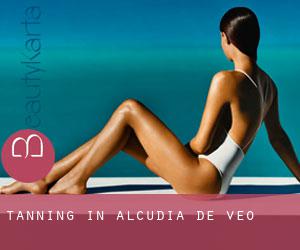 Tanning in Alcudia de Veo